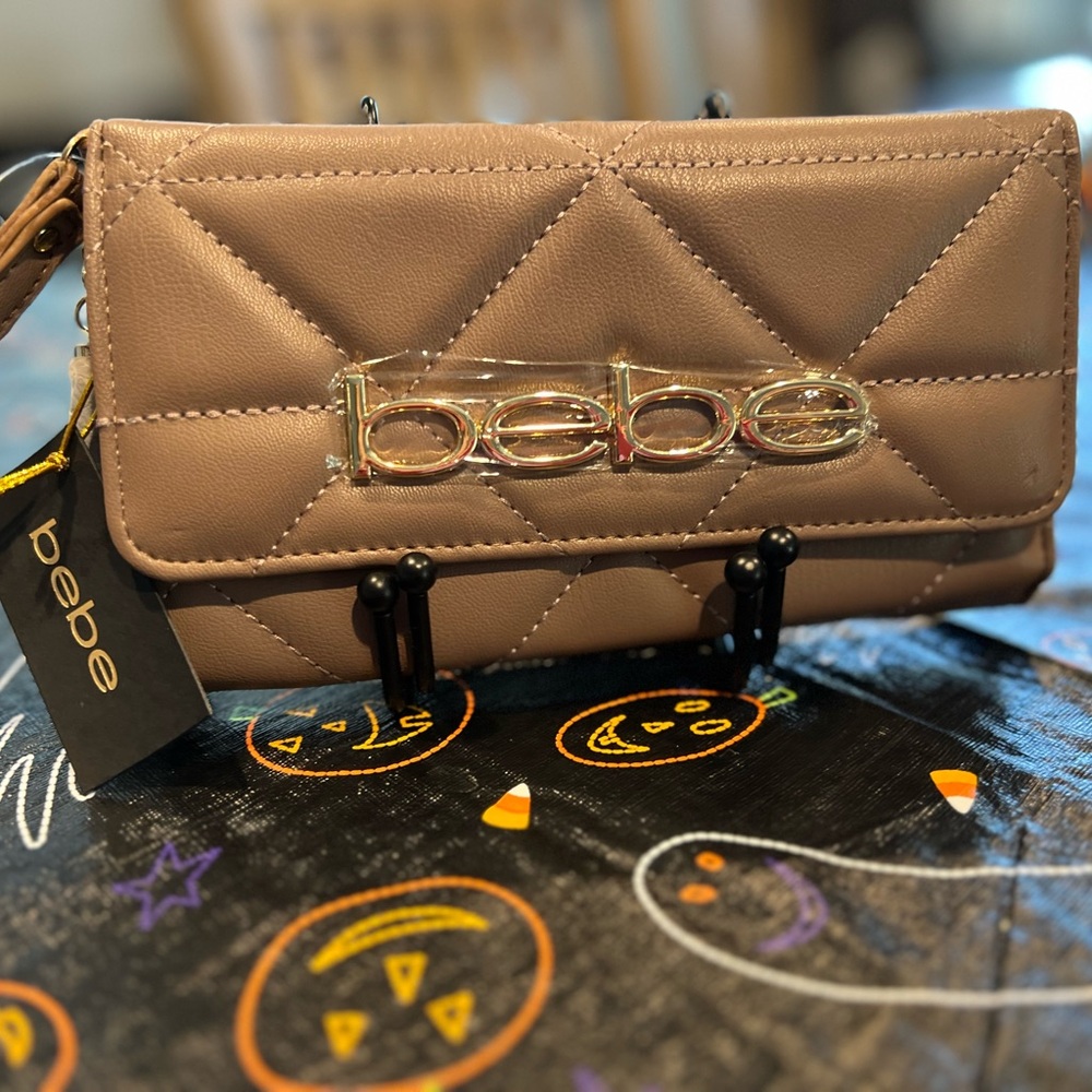 NWT Bebe Trifold Taupe Wristlet.